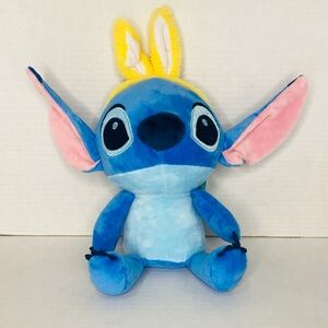 Disney’s 2024 Easter Bunny Stitch Blue and Pink Stuffed Animal with Yellow Ears.